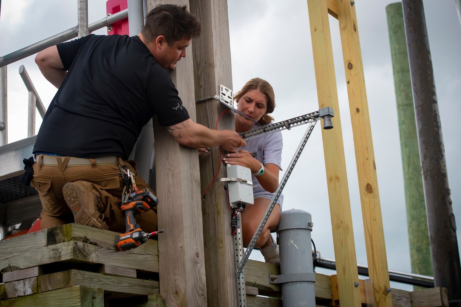Students working on dock equipment