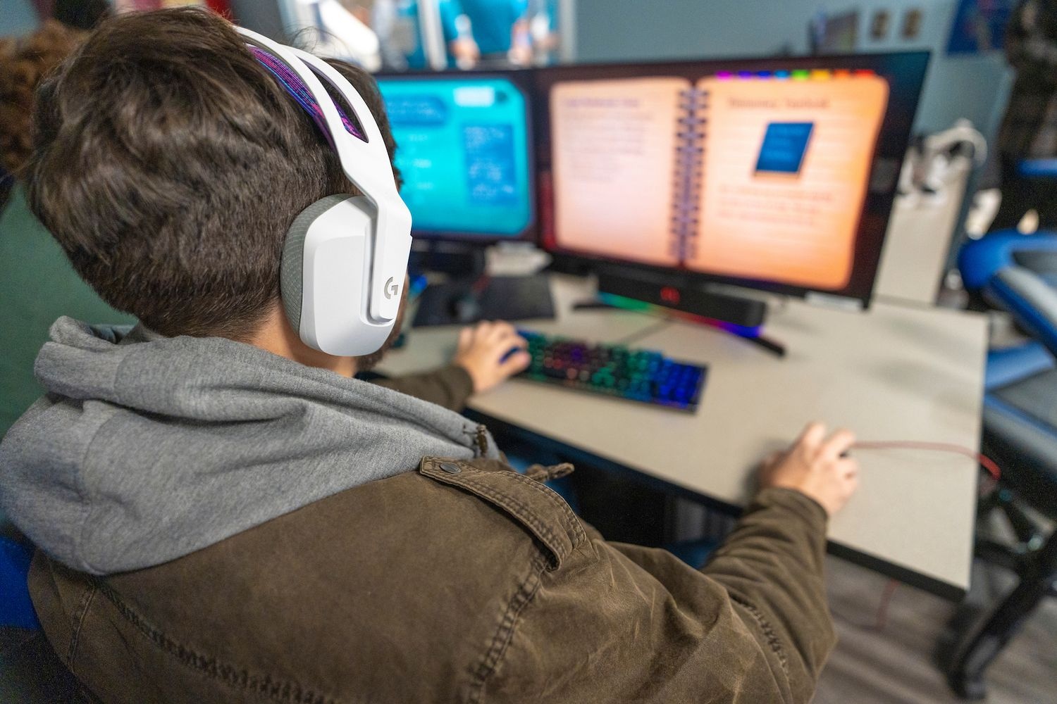 Student listening to video with headphones