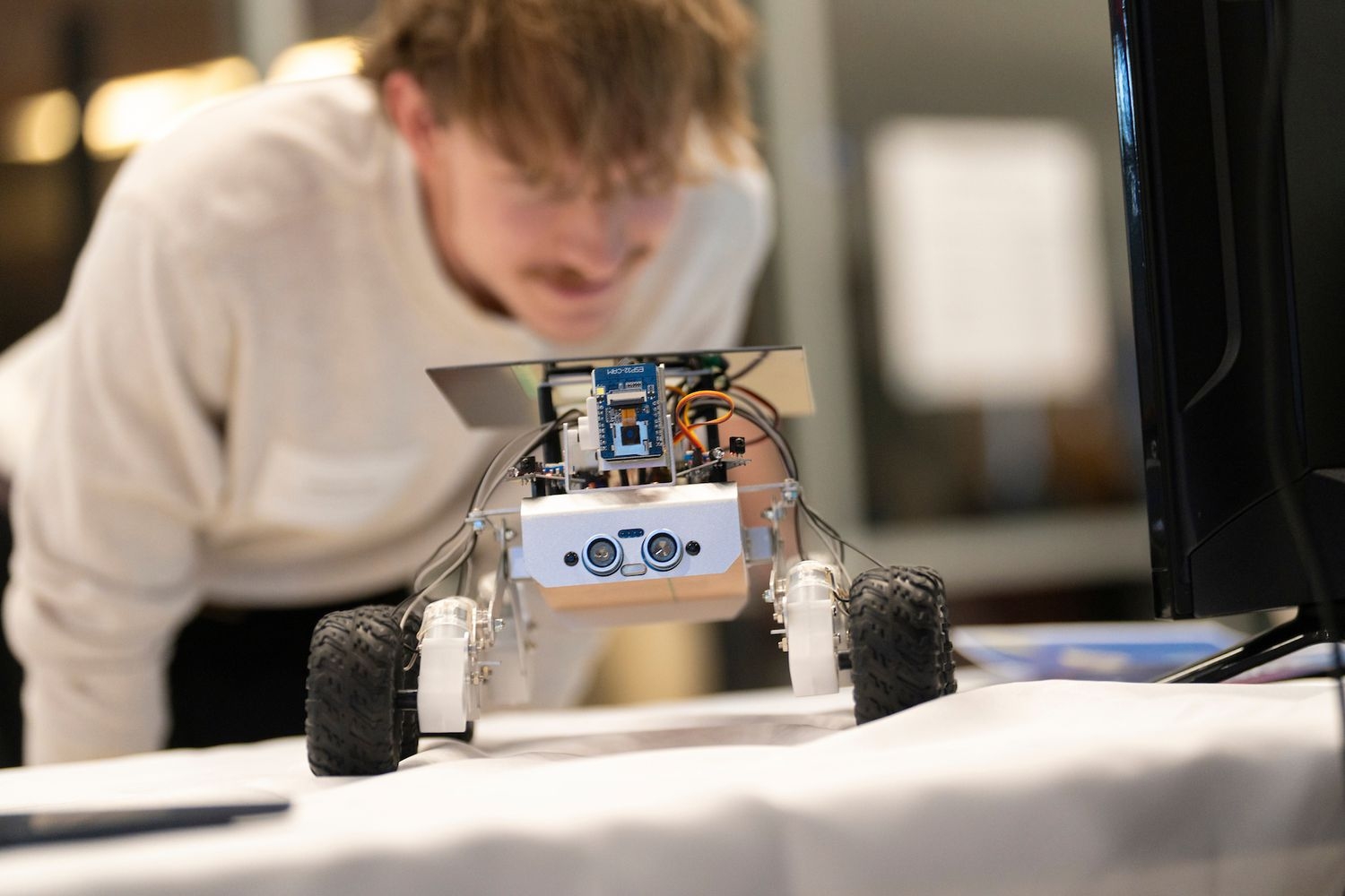 remote control car with equipment on top