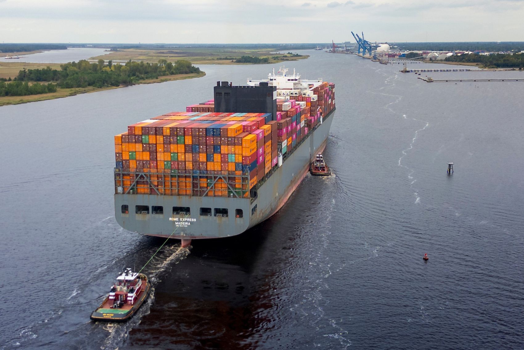 Container Ship Rome Express, flying under the Portugal flag and stretching to 366 meters, enters the Port of Wilmington fully loaded.