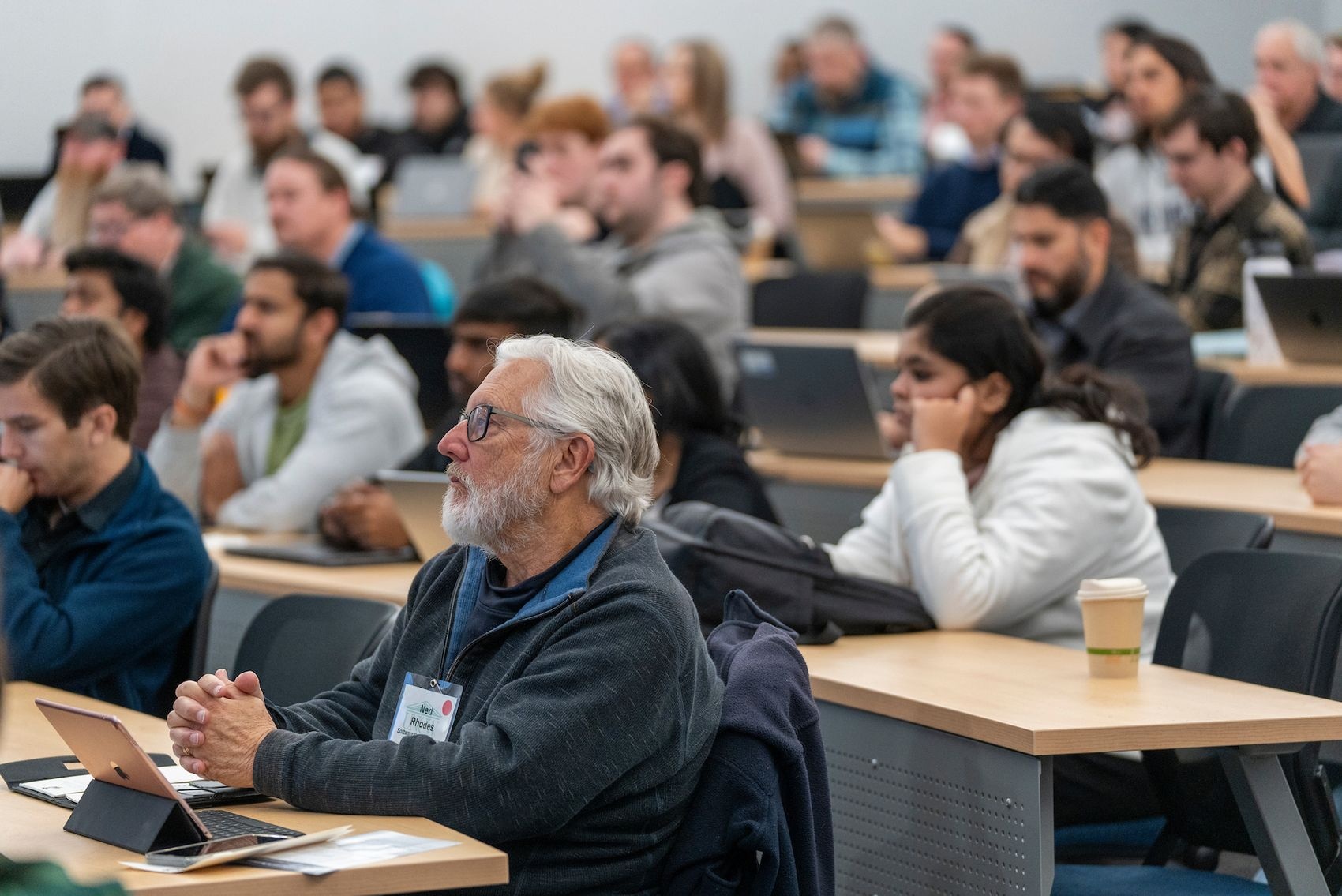Attendees engage in discussions and networking at the 19th annual Wilmington Information Technology eXchange (WITX) held at Congdon Hall on the UNCW campus.