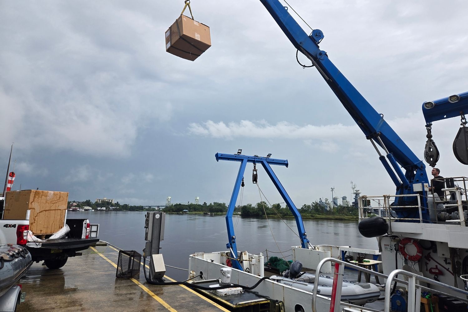 Drifters, used to measure sea surface temperature, air pressure, properties of waves and more, being loaded onto the R/V Cape Hatteras ahead of its expedition to the Gulf Stream.