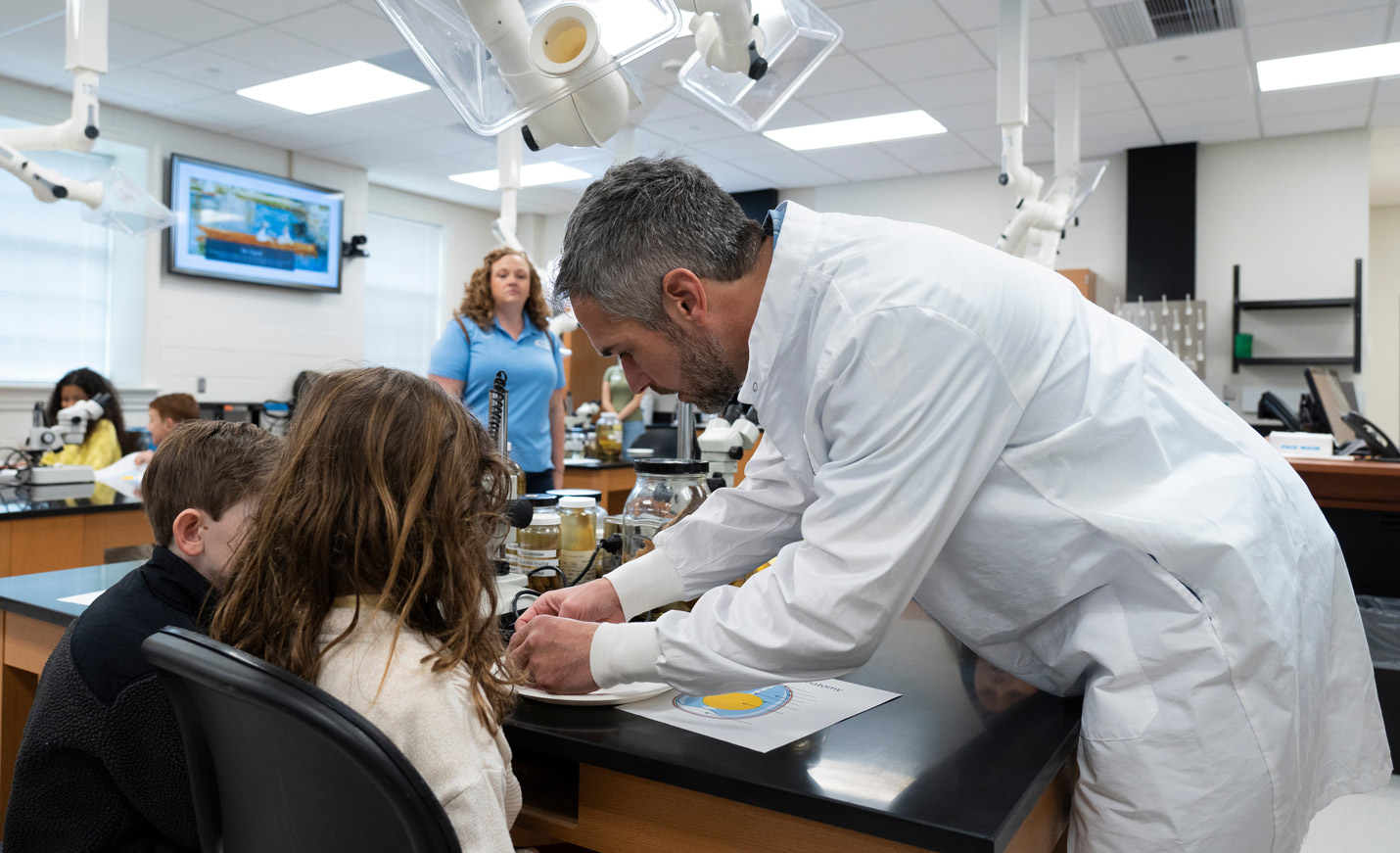 Scientist Helps Students