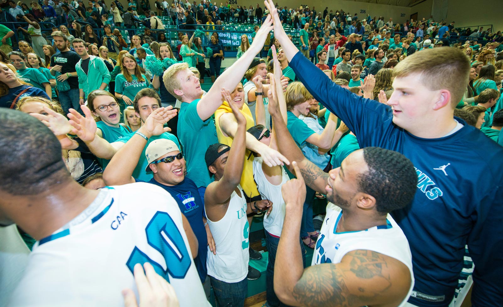 Students highfiving