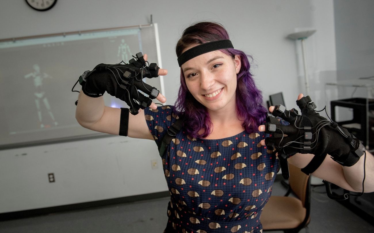 Student Demonstrating VR Equipment