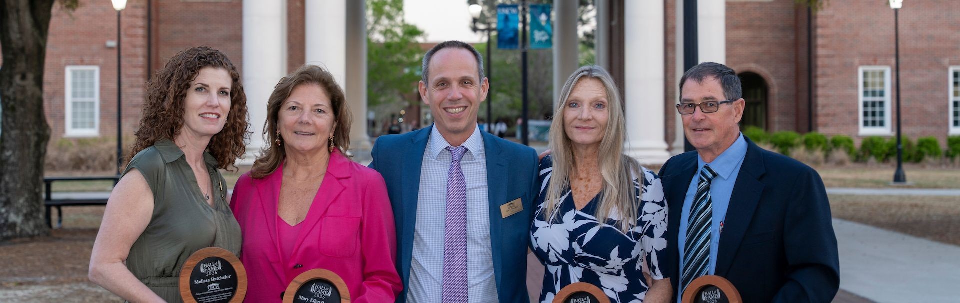 Dean Jack Watson (center) poses with four of the five 2026 Hall of Fame inductees (l to r): Melissa Batchelor, Mary Ellen Bonczek, Renee McLaughlin, and Mark Scalf. 