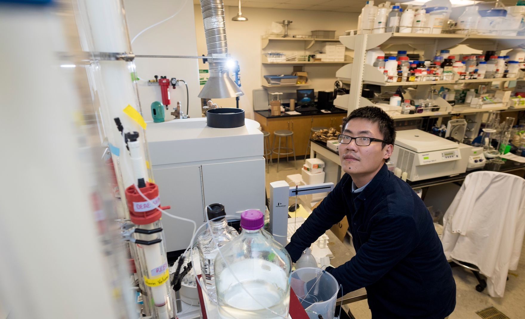 person in lab working on vaccines