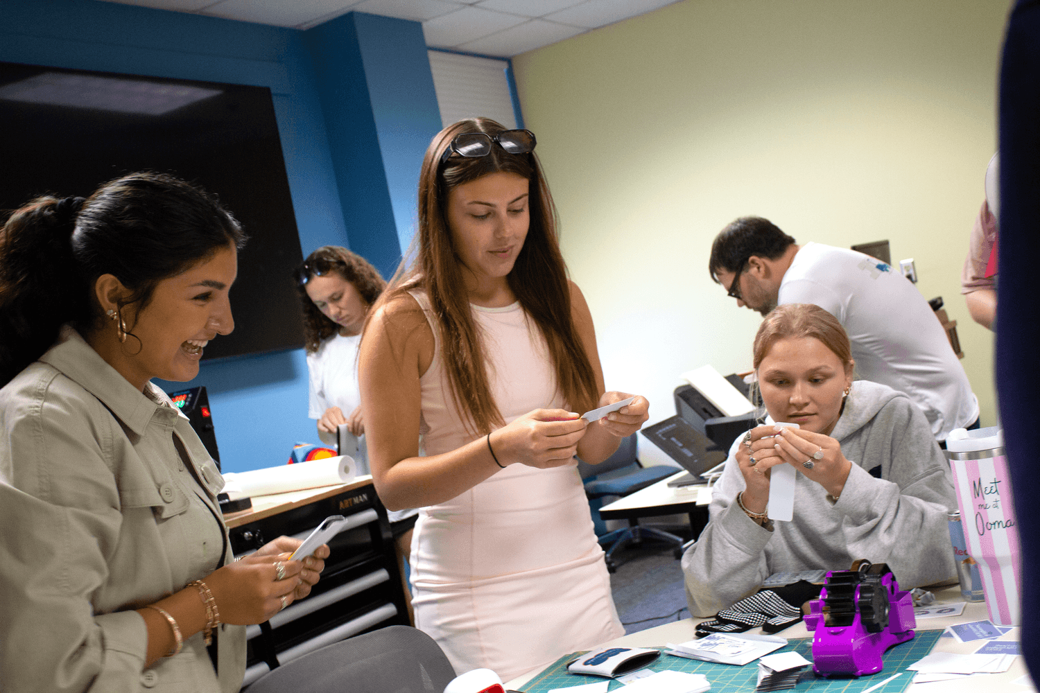 Students work on creative promotional products