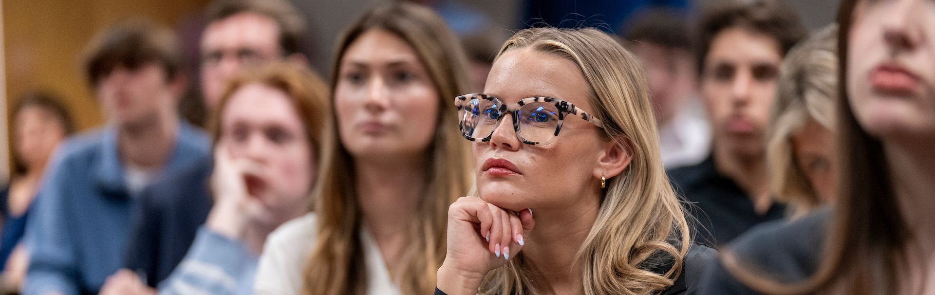 female student listening during class