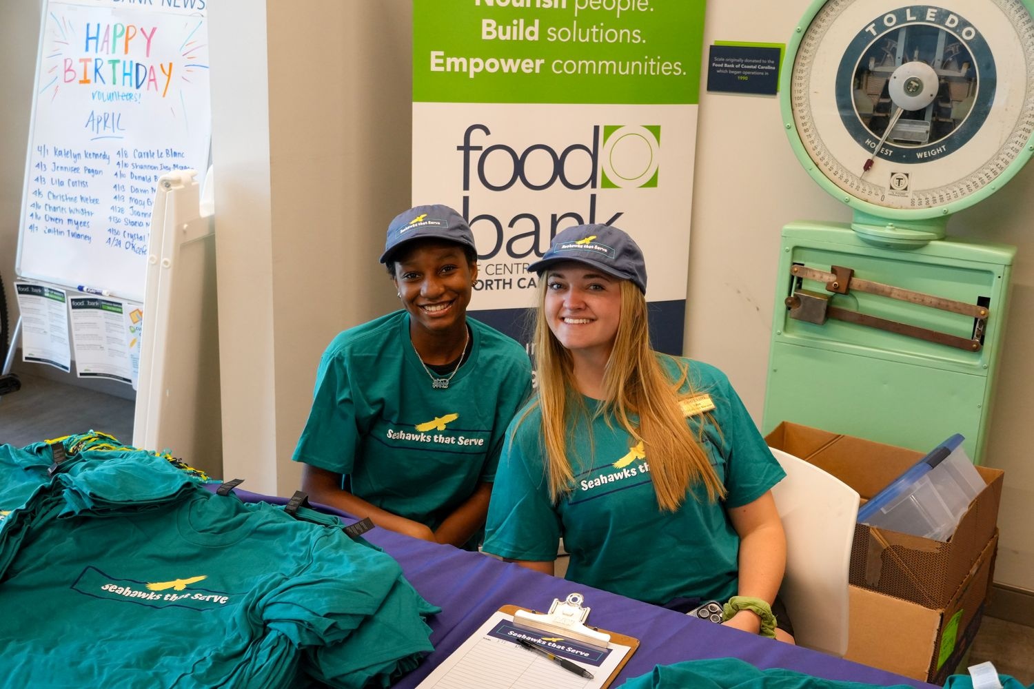 two participants attending a Food Bank event