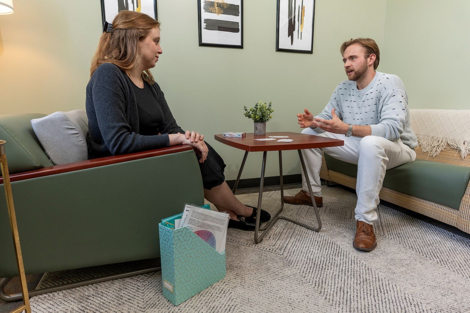 Two people speaking in a GPAC therapy room