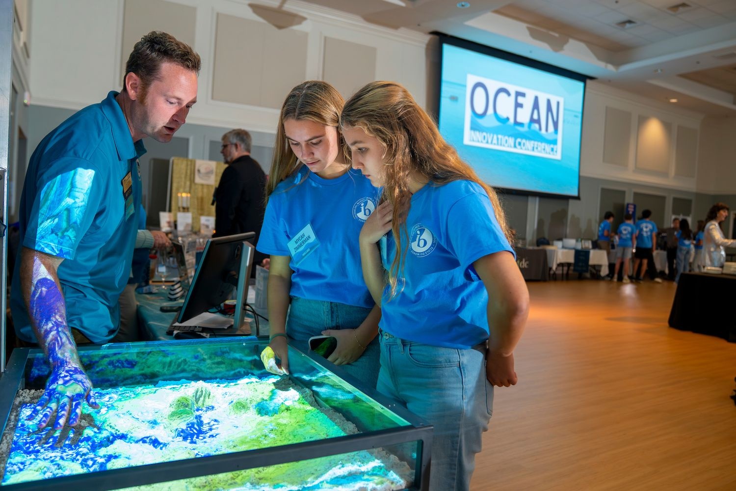 Conference goers viewing a map