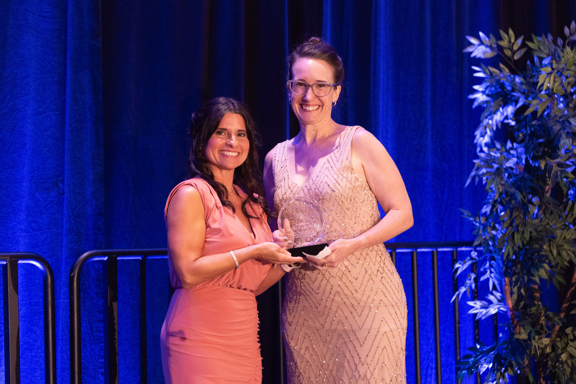 Associate professor Michaela Howells (right) is the recipient of a 2023 Equity Award from the New Hanover County Office of Diversity and Equity.
