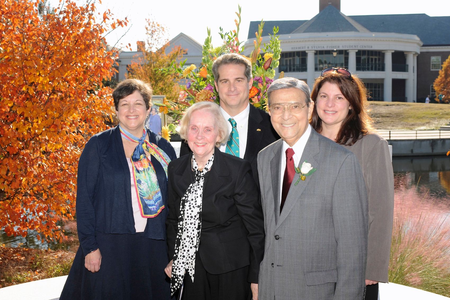 Sylvia Watson Fisher, center,  with husband, Herbert Fisher, are joined by their children,  Pam Snyder, left; Carlton Fisher, center;  and Diana Abbott at the Fisher Memorial Garden. 