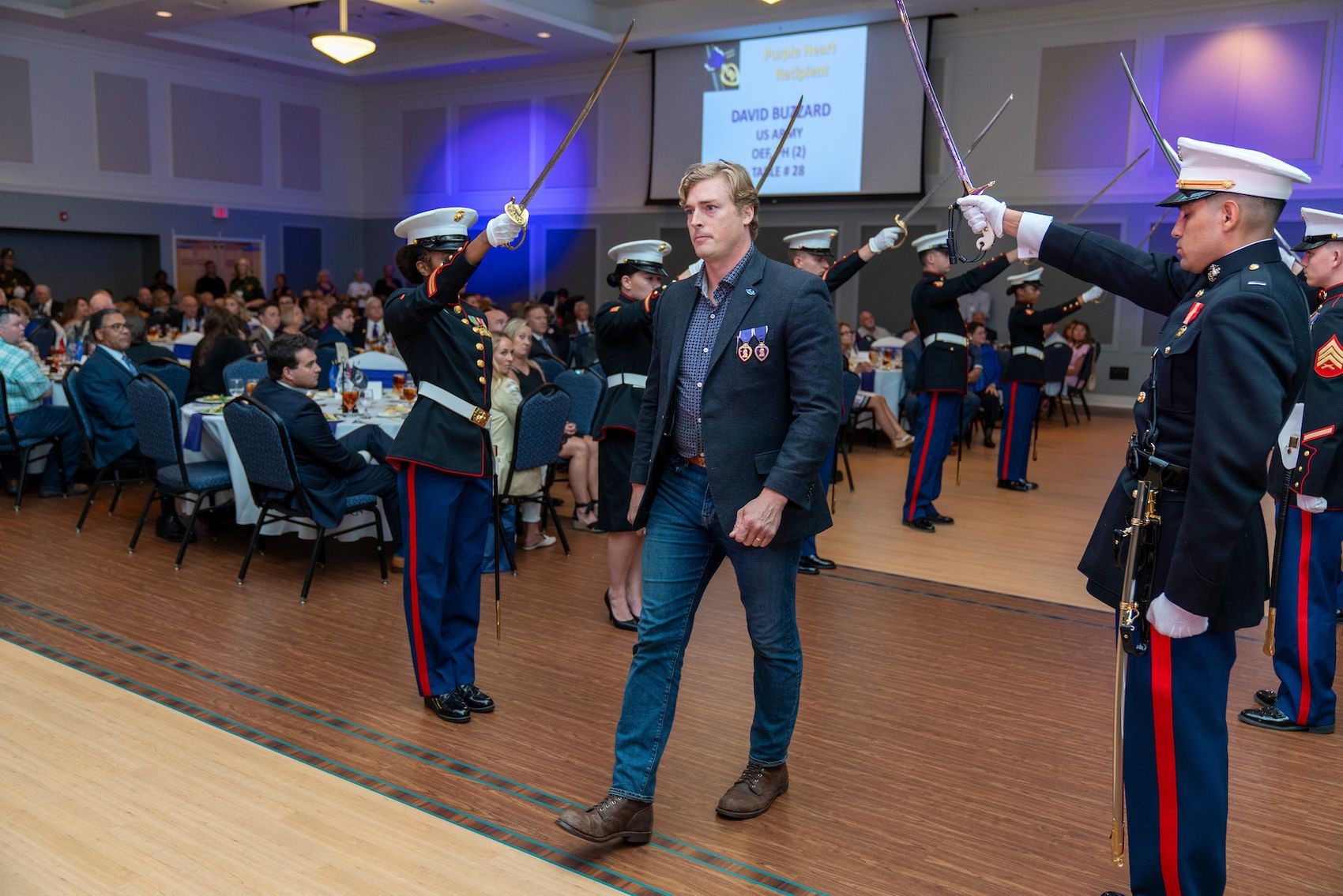 Army veteran and alum David Buzzard ’18 presented his Purple Heart to UNCW during the annual Cape Fear Purple Heart dinner held Aug. 2 on the UNCW campus