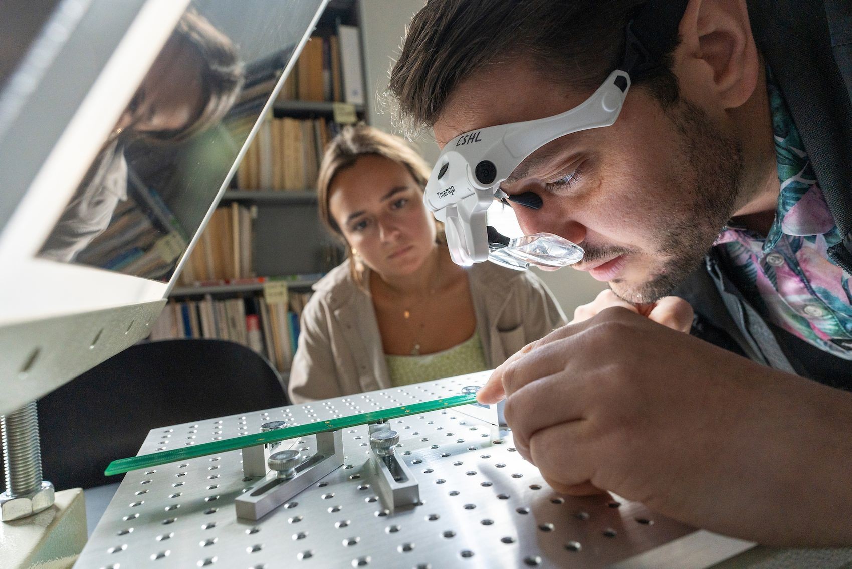 Researchers in lab.
