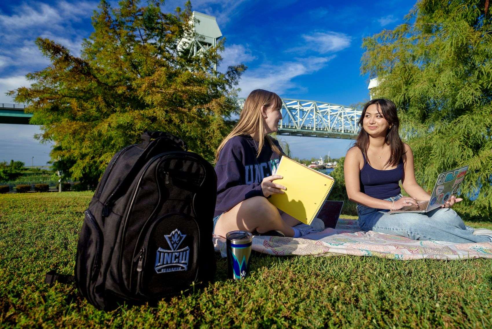 UNCW Students with Cape Fear Memorial Bridge in background