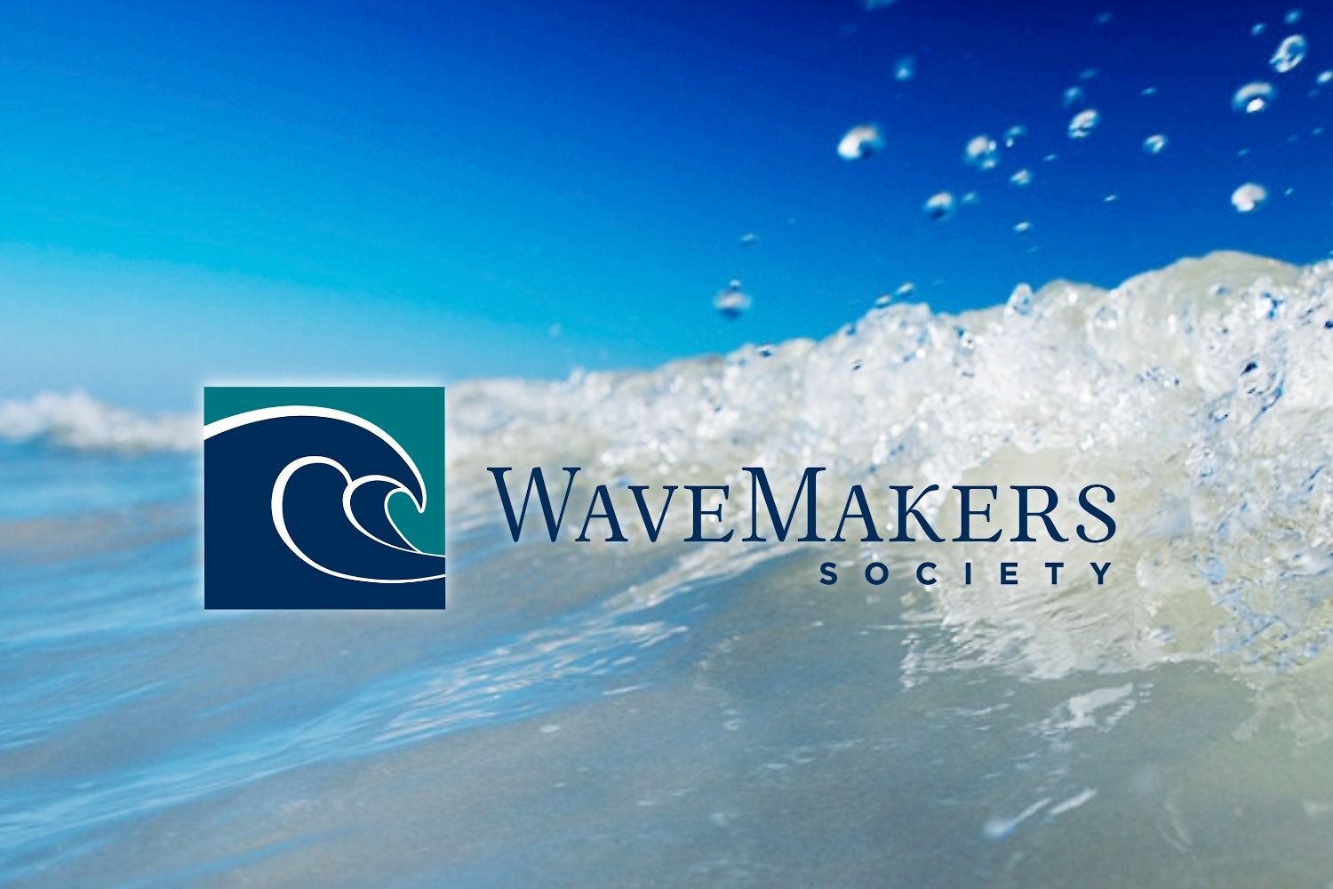 WaveMakers Society logo on top of wave photo