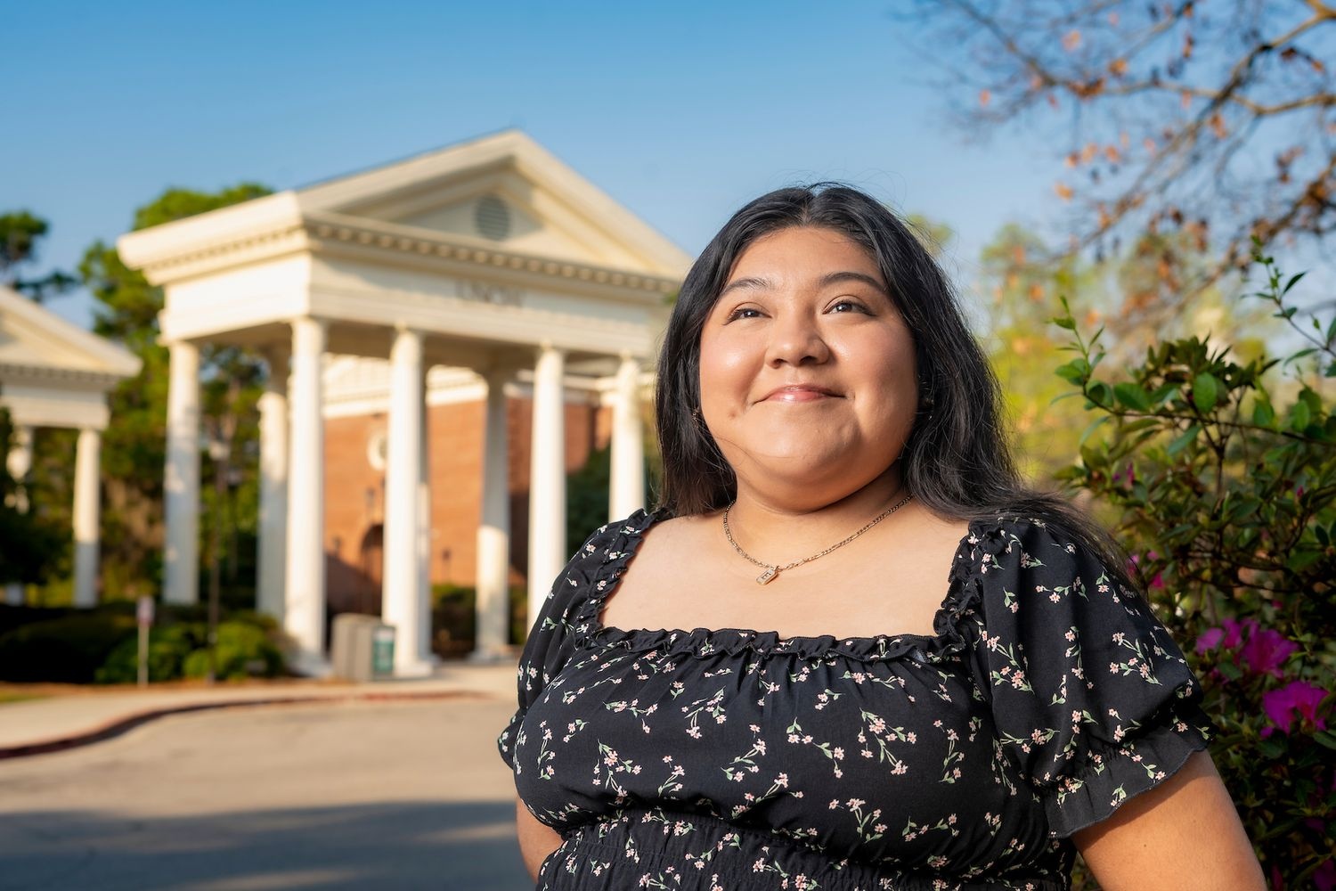 Elizabeth Hernandez pose on the UNCW campus